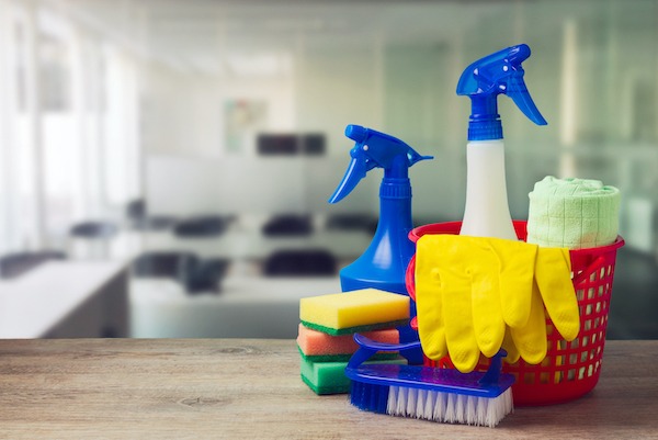Office cleaning service concept with supplies Office cleaning service concept with supplies